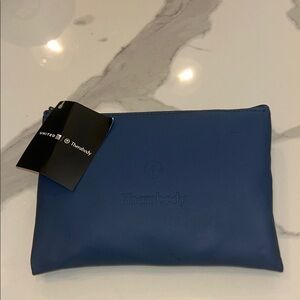 Therabody Blue Toiletry Bag with amazing products